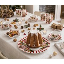 Dettaglio del decoro interno con cuoricino dorato e delle illustrazioni di caramelle natalizie sulla tazza jumbo
